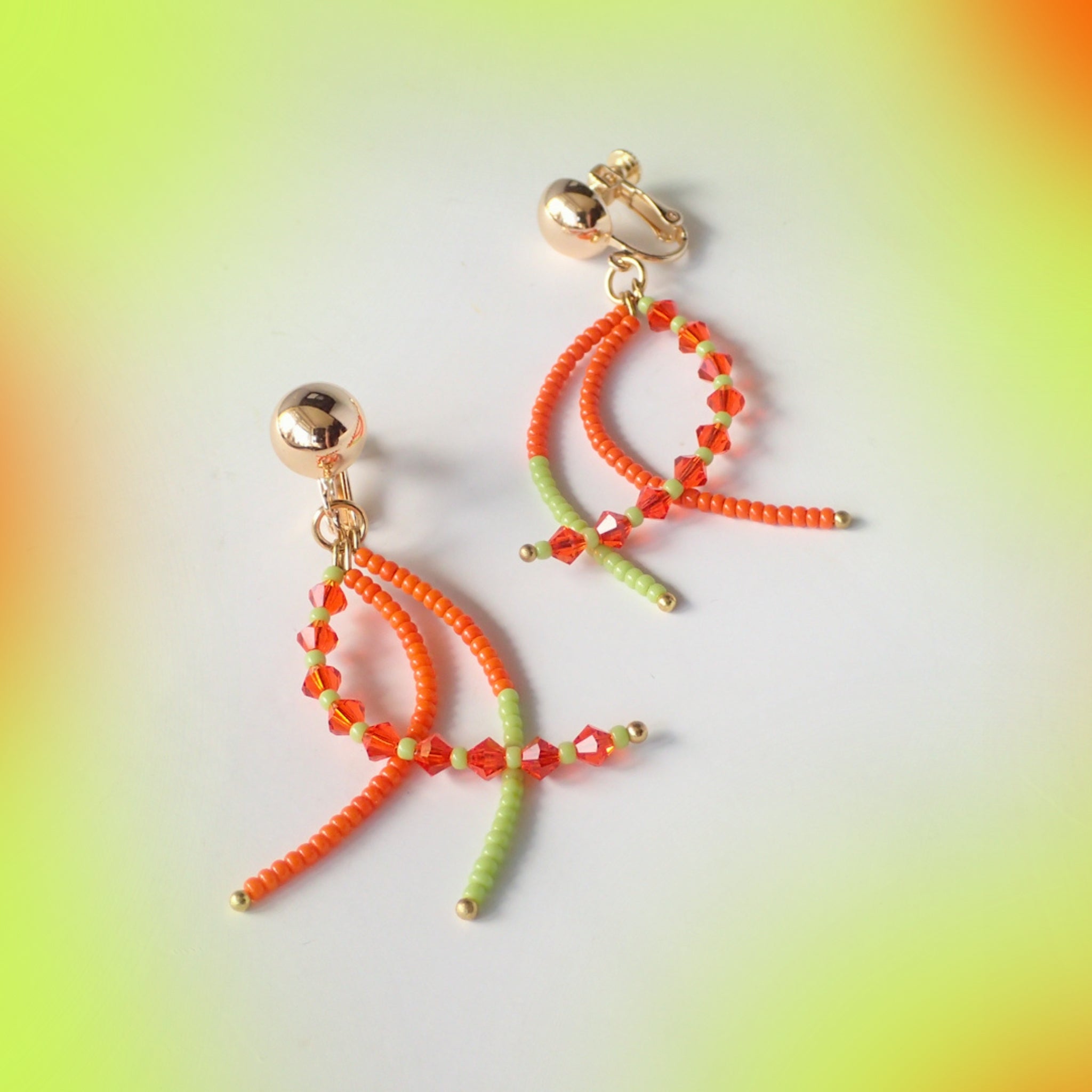 Orange and green on sale earrings